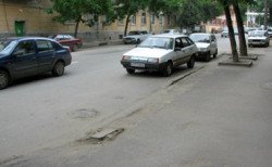 В этом году на дорогах столицы поменяют два слоя покрытия