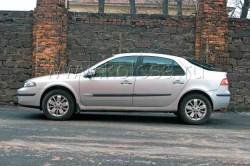 Renault Laguna: Мадам ждет внимания