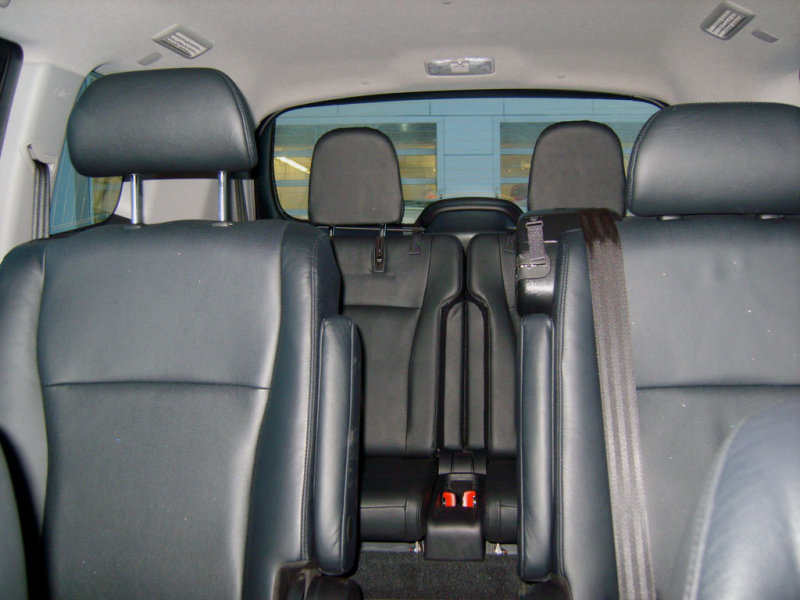 Обзорность назад можно признать лишь удовлетворительной