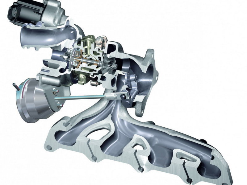 А вот и коллектор с турбиной и перепускным клапаном