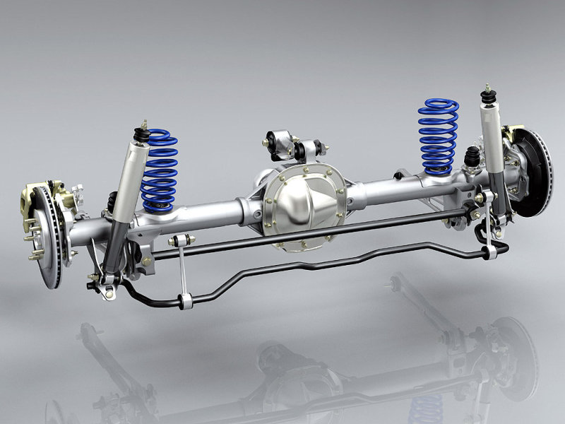 Неразрезный задний мост подвешен на направляющих рычагах и винтовых пружинах